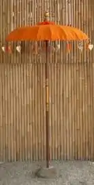 Bali umbrella, flame with metal coins and golden hearts hanging around the edge, ø 130 cm and 250cm height Flame